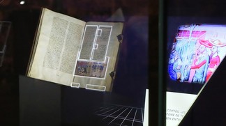 A holographic showcase augmenting an ancient manuscript (Copyright EPFL)